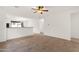 Open-concept space with tile flooring, seamlessly connecting the living area to the kitchen and dining at 10758 E Peralta Canyon Dr, Gold Canyon, AZ 85118