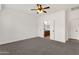 Bedroom with ceiling fan and ensuite bathroom at 10758 E Peralta Canyon Dr, Gold Canyon, AZ 85118