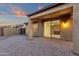 Covered patio overlooking the backyard and the beautiful sunset at 10758 E Peralta Canyon Dr, Gold Canyon, AZ 85118