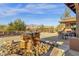 Outdoor patio with a unique stone water feature and mountain views at 10758 E Peralta Canyon Dr, Gold Canyon, AZ 85118