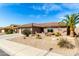 Attractive single-story home with a three car garage, desert landscaping, and covered patio at 11056 E Nopal Ave, Mesa, AZ 85209