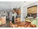 A kitchen area featuring stainless steel appliances, wooden cabinets and granite countertops at 11056 E Nopal Ave, Mesa, AZ 85209