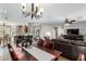 Elegant living room with open layout to kitchen and dining area at 11056 E Nopal Ave, Mesa, AZ 85209