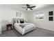 Cozy bedroom with neutral walls, carpeted floors, and a ceiling fan at 1206 E Loyola Dr, Tempe, AZ 85282