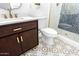 Stylish bathroom with vanity, marble countertops and patterned tile floor at 1206 E Loyola Dr, Tempe, AZ 85282