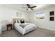 Cozy bedroom with plush carpet, a window, and soothing decor at 1206 E Loyola Dr, Tempe, AZ 85282