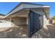 Modern carport featuring decorative brick accent wall and space for vehicle parking at 1206 E Loyola Dr, Tempe, AZ 85282