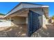 The covered carport features black lattice detail, shade and protection from the elements at 1206 E Loyola Dr, Tempe, AZ 85282