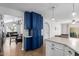 Open-concept kitchen adjacent to dining area featuring ample cabinet and countertop space at 12601 S Tonto Ct, Phoenix, AZ 85044