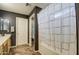 Full bathroom featuring a bathtub with shower, vanity, and toilet at 13556 W Desert Flower Dr, Goodyear, AZ 85395