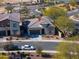 Aerial view of a lovely single-Gathering home with desert landscaping in a well-planned community at 139 E Desert Broom Dr, Chandler, AZ 85286