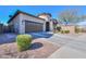 Well-maintained home with neat landscaping, featuring a two-car garage and a charming turret entrance at 139 E Desert Broom Dr, Chandler, AZ 85286