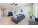 Comfortable living room featuring a plush sectional sofa, modern furnishings, and ample natural light at 139 E Desert Broom Dr, Chandler, AZ 85286