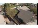 A bird's eye view of a well-maintained home with tiled roof surrounded by mature trees at 1431 S Nielson St, Gilbert, AZ 85296