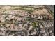 An aerial view of a neighborhood featuring private pools and a nearby golf course at 1431 S Nielson St, Gilbert, AZ 85296