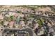 An aerial view of a residential area close to a golf course with many backyards having private pools at 1431 S Nielson St, Gilbert, AZ 85296