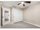 A bedroom with neutral color and closet at 1431 S Nielson St, Gilbert, AZ 85296