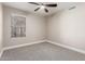 A comfortably designed bedroom with ceiling fan and window at 1431 S Nielson St, Gilbert, AZ 85296