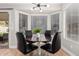 Bright breakfast nook features bay windows and a stylish round table at 1431 S Nielson St, Gilbert, AZ 85296