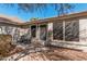 Inviting front porch area with seating, desert landscaping, and a welcoming sign at 1431 S Nielson St, Gilbert, AZ 85296