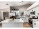 Spacious kitchen with a large island, white cabinetry, and stainless steel appliances at 1431 S Nielson St, Gilbert, AZ 85296