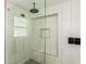 A modern tiled shower stall with glass door at 1431 S Nielson St, Gilbert, AZ 85296