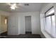 Bedroom with a closet and large window at 14334 W Avalon Dr, Goodyear, AZ 85395