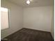 Empty bedroom with large window providing lots of natural light at 14334 W Avalon Dr, Goodyear, AZ 85395
