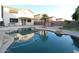 Swimming pool in the backyard, perfect for outdoor relaxation and entertainment at 14334 W Avalon Dr, Goodyear, AZ 85395