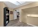 Hallway with natural light from skylights; doorway leads to another room at 15011 N 45Th Pl, Phoenix, AZ 85032