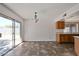 Open dining area with tile floors next to sliding glass doors at 15652 N 52Nd St, Scottsdale, AZ 85254