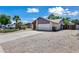 Charming single-story home with a two-car garage and desert landscaping at 15652 N 52Nd St, Scottsdale, AZ 85254