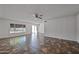 Bright living room area featuring a ceiling fan and ample sunlight at 15652 N 52Nd St, Scottsdale, AZ 85254