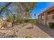 Large private backyard with desert landscaping, ideal for relaxation and enjoying the beautiful surroundings at 15843 E Mustang Dr, Fountain Hills, AZ 85268