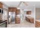 Kitchen featuring stainless steel fridge, granite countertops and custom cabinets at 15843 E Mustang Dr, Fountain Hills, AZ 85268