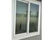 Bright window with slim profile blinds for privacy and light control at 1630 N 58Th Ave, Phoenix, AZ 85035