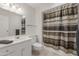 Bathroom with a single sink vanity and tub shower combo at 17247 N 106Th Ave, Sun City, AZ 85373