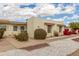 Inviting single-story home featuring a well-maintained front yard with rock landscaping at 17247 N 106Th Ave, Sun City, AZ 85373