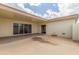 Spacious covered patio with sliding glass doors, perfect for outdoor entertaining at 17247 N 106Th Ave, Sun City, AZ 85373