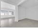 Open living room with tile floors at 19094 E Broadmoor Trl, Queen Creek, AZ 85142