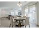 Bright dining area with sliding glass doors and views of the outdoors at 1915 W Hide Trl, Phoenix, AZ 85085