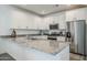 Modern kitchen with granite countertops and stainless steel appliances at 1915 W Hide Trl, Phoenix, AZ 85085