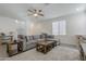 Cozy living room featuring a sectional sofa and stylish coffee table at 1915 W Hide Trl, Phoenix, AZ 85085