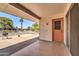 Enjoy outdoor living on this covered patio with concrete floor and views of the landscaped yard at 20006 N Concho Cir, Sun City, AZ 85373