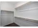 Empty walk-in closet with shelving and rack, perfect for wardrobe organization at 2019 E Entoro Dr, Casa Grande, AZ 85122