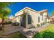 Exterior backyard with a paver area, desert landscaping and a partial view of neighbors at 21 W Ranch Rd, Tempe, AZ 85284