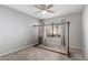 Bedroom showcasing natural light from a window and neutral colored walls at 21 W Ranch Rd, Tempe, AZ 85284