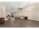 Spacious living room featuring dark floors, high ceilings, and stylish furnishings at 21 W Ranch Rd, Tempe, AZ 85284