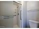 Shower with glass doors and a comfort height toilet in the bathroom at 2113 N Squire Ave, Tempe, AZ 85288