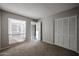 Bedroom features carpet and closet at 2113 N Squire Ave, Tempe, AZ 85288